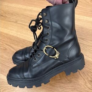Tod’s black buckled leather combat boots size 7.5